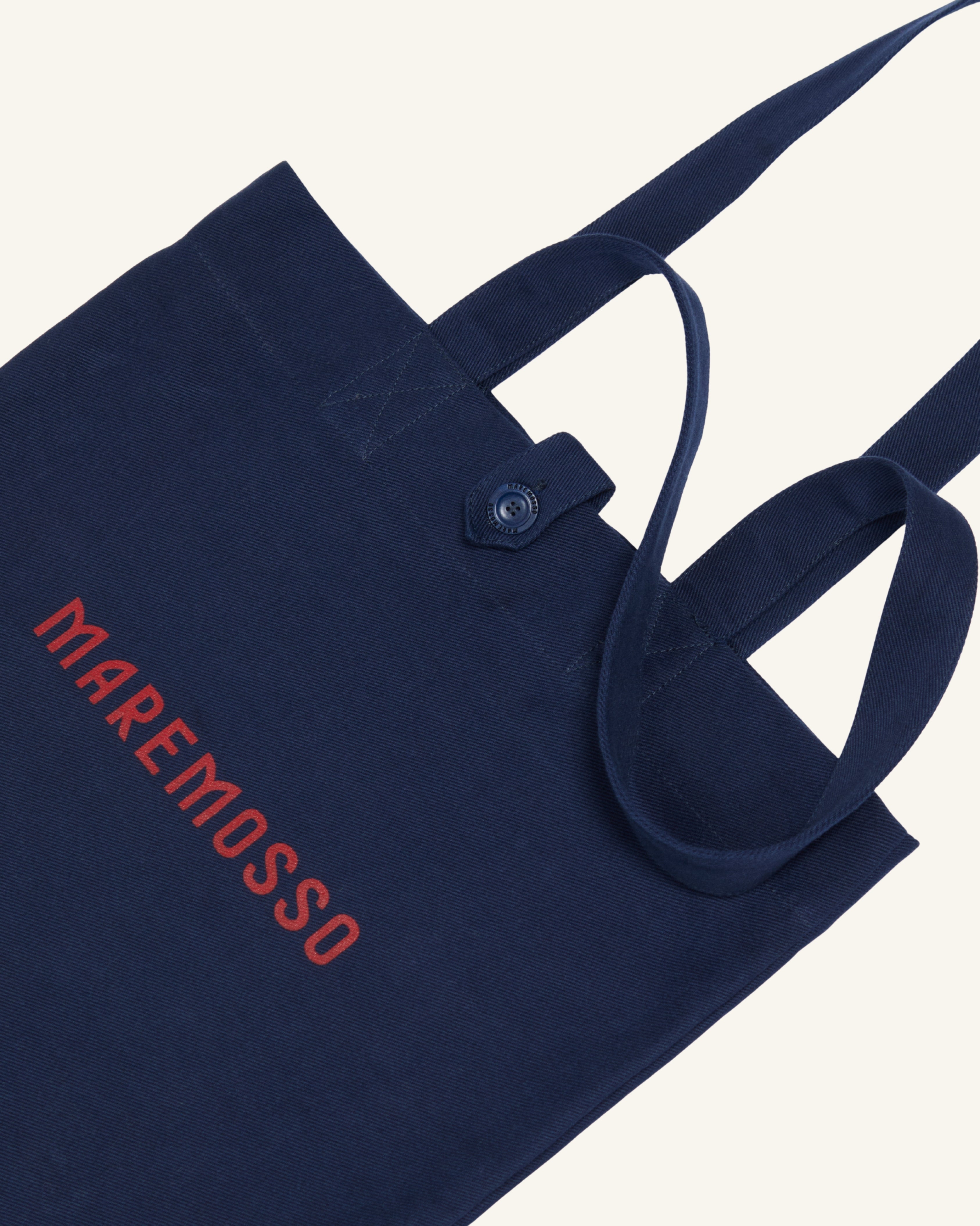 Tote bag in cotone blu mediterraneo con logo Maremosso stampato a mano